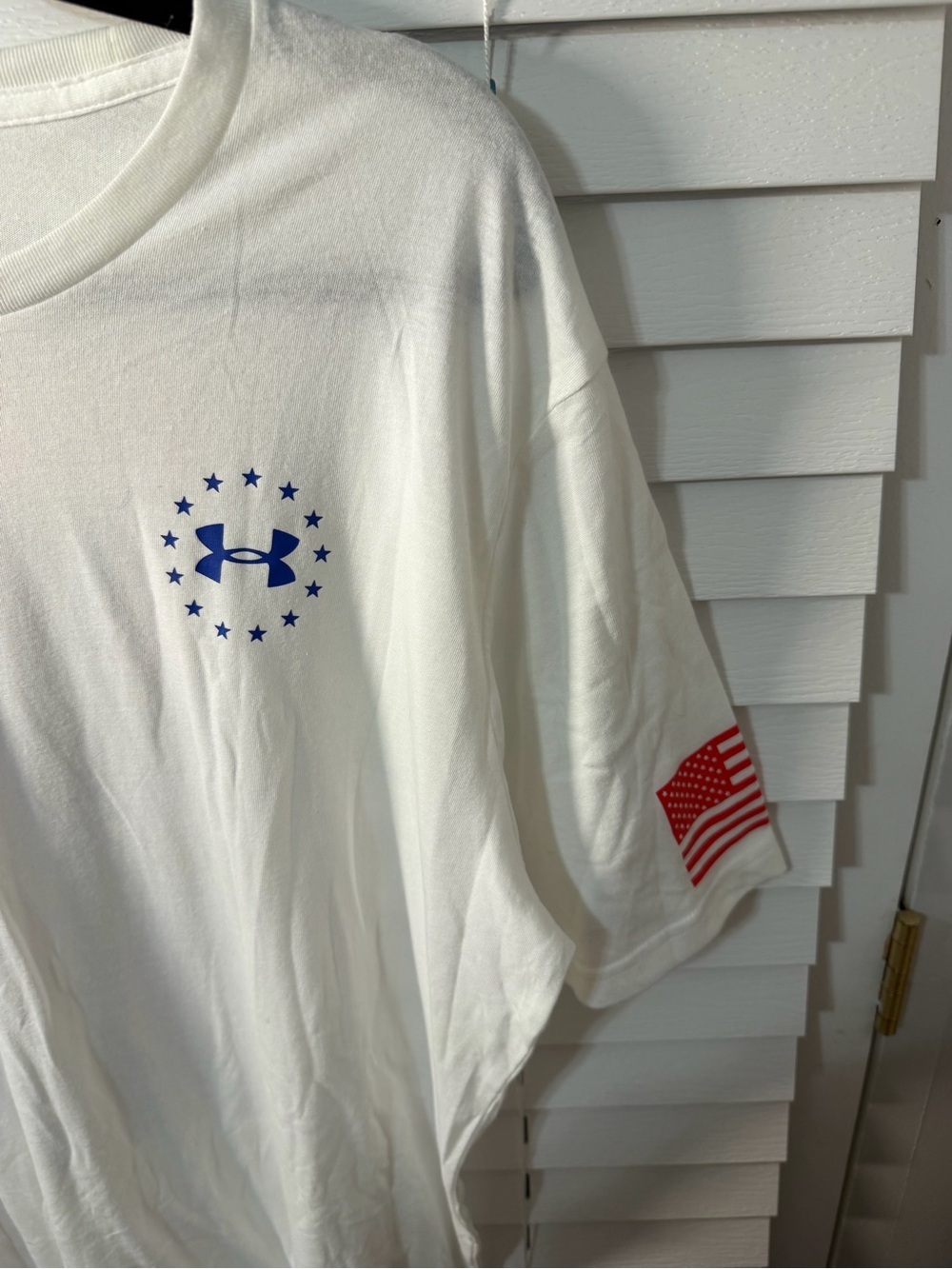 LG White Short-Sleeve Tee with Blue Logo and Red Flag